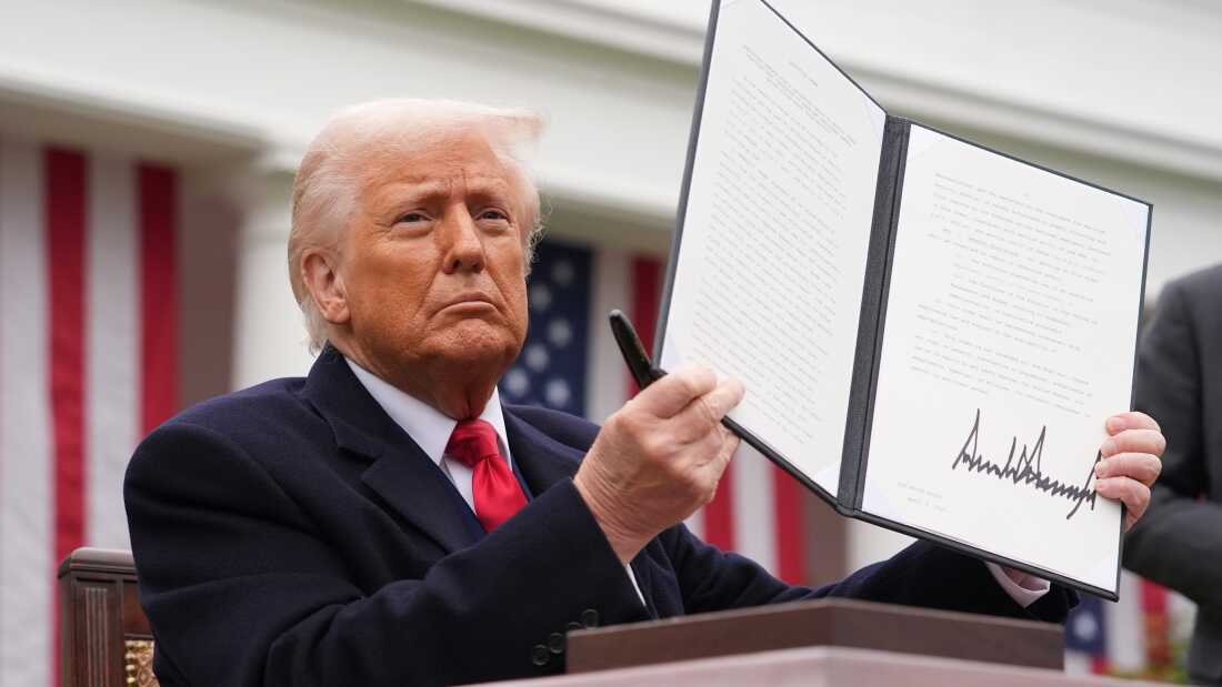 WASHINGTON, DC - APRIL 02: U.S. President Donald Trump displays a signed executive order imposing tariffs on imported goods during a “Make America Wealthy Again” trade announcement event in the Rose Garden at the White House on April 2, 2025 in Washington, DC. Touting the event as “Liberation Day”, Trump announced sweeping new tariffs targeting goods imported to the U.S. on countries including China, Japan and India. (Photo by Andrew Harnik/Getty Images)